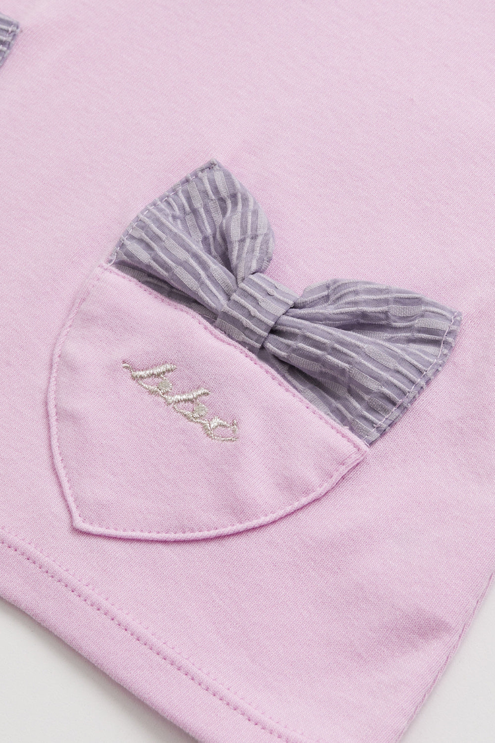 【予約商品】Mainコレクション:Love Note フリルカラー ハートポケット リボン オーガニックコットン長袖トップス