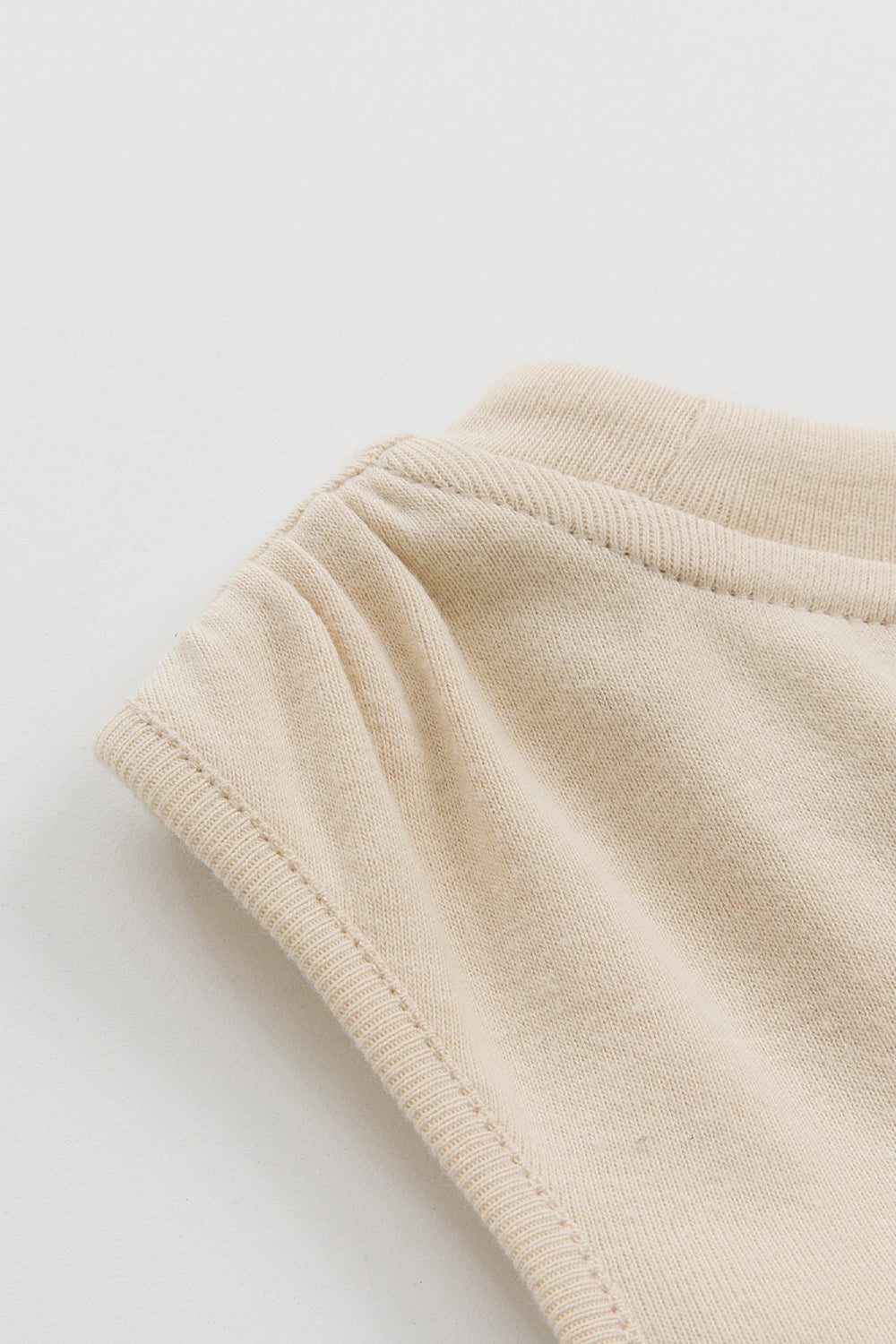 【予約商品】Luxury コレクション:Mini Fleur ツイストノースリーブトップス