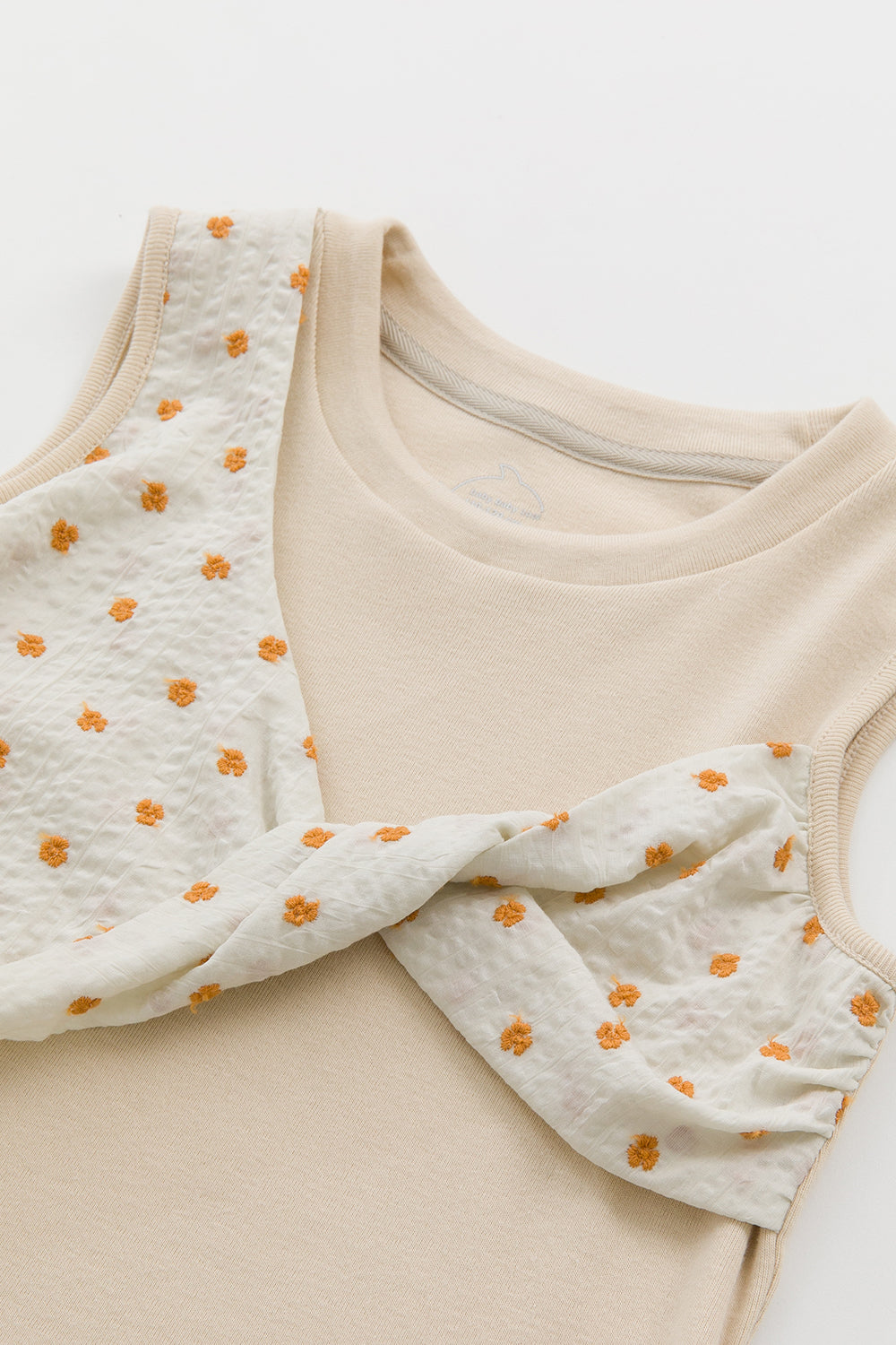 【予約商品】Luxury コレクション：Mini Fleur ツイストノースリーブトップス